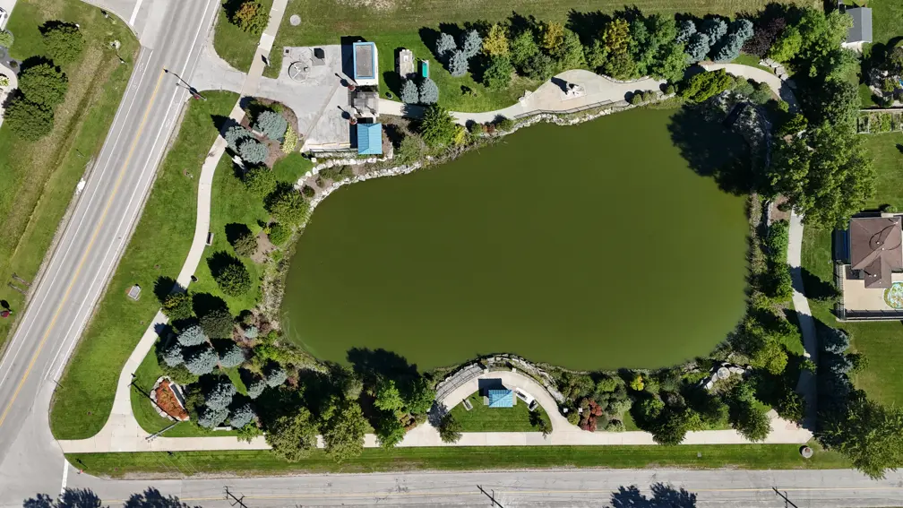 Drone view of entire park including pond and trail