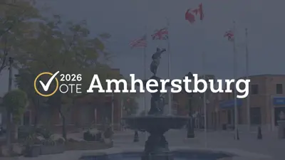 2026 Vote Amherstburg with an image of the Town Square featuring flags, the fountain and clock tower