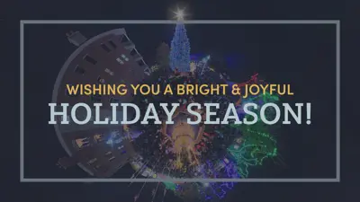 Wishing you a bright and joyful holiday season with an image of the municipal tree in the background
