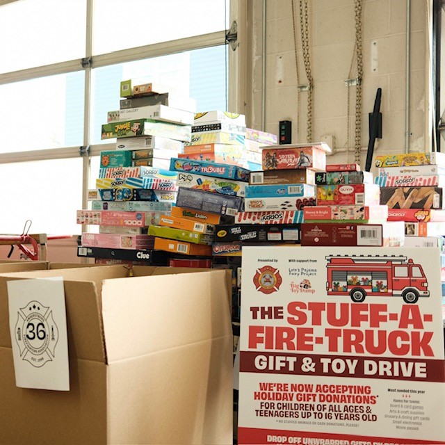 Stuff-A-Fire-Truck toy drive image with a picture of miscellaneous toys