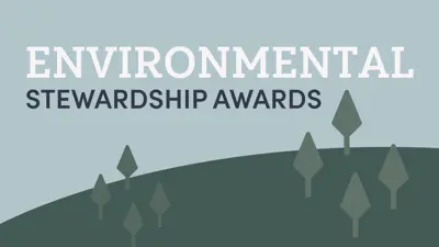 Environmental Stewardship Awards with green trees surrounding the words
