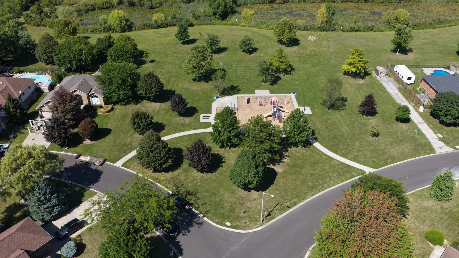 Aerial image of playground, pathways and trees