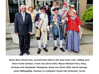 River Town Times Newspaper Image of group: Norm Ross (front row, second from left) is the new town crier, taking over from Frank Gorham. Front row (from left): Mayor Michael Prue, Ross, Gorham and Stephanie Thompson. Back row (from left): Karen Gyorgy, Janet Willoughby, tourism co-ordinator Sarah Van Grinsven, Terris Buchanan, Murray Speers and Lynda Fleury.